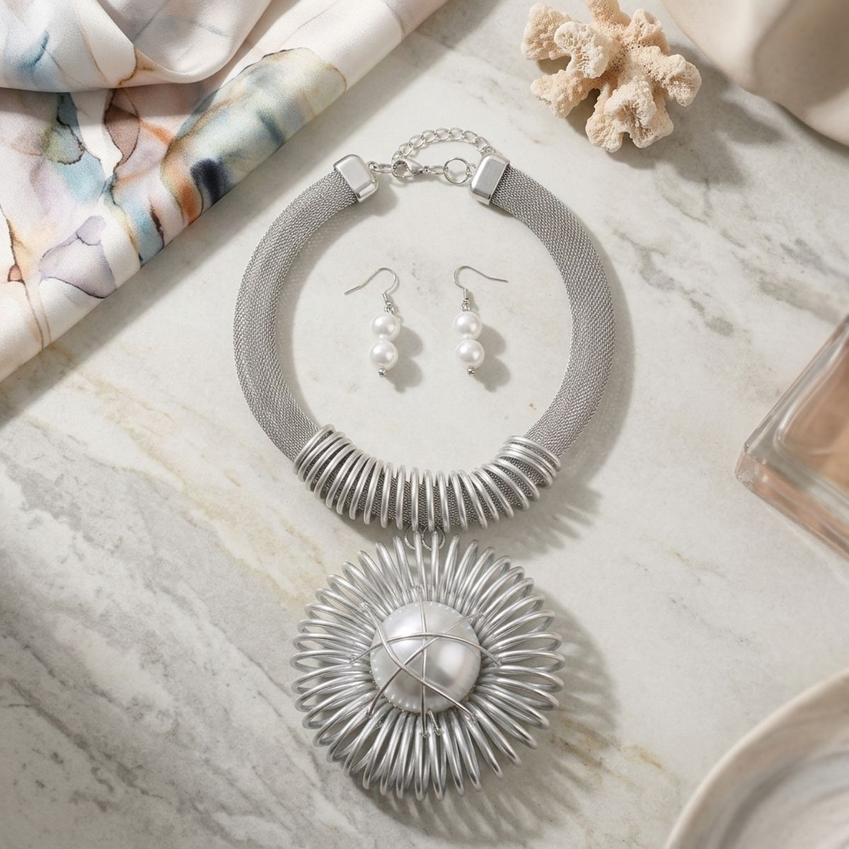 Silver Mesh Necklace with Spiral Sunburst Pendant